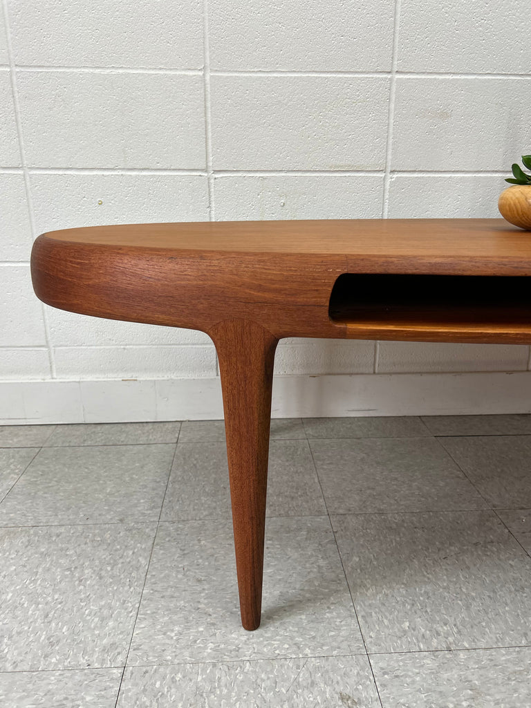 Oval teak coffee table