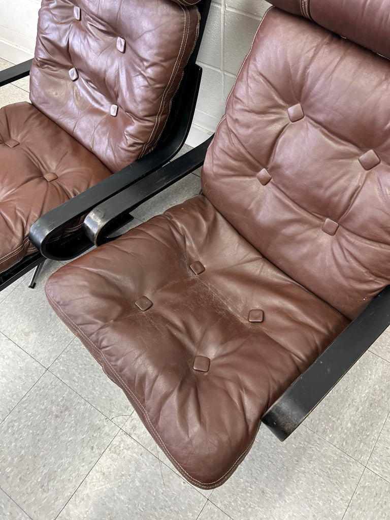 Leather lounge pair